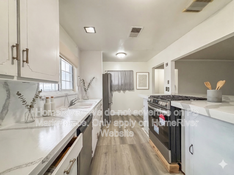 See it before its gone! 4BR Home w/ Attached Garage | Yard property image